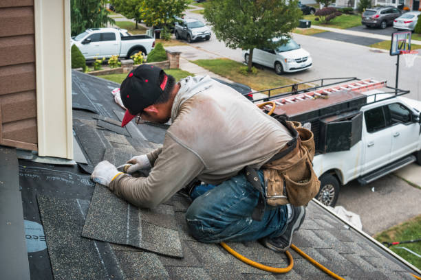 Professional Roofing technician working in Columbia, CA